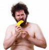 17656067-wild-undressed-man-with-crazy-hair-and-beard-holding-a-banana-in-his-hands-studio-shot-.jpg