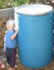 water_barrel_and_baby.jpg