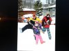 dad and kids rocking out on the slopes.jpg