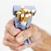 hand-crumpling-a-pack-of-cigarettes.jpg