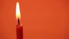 stock-footage-single-orange-candle-burning-with-an-orange-background-hd-x.jpg