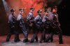 Full Monty cops dancing (red).jpg