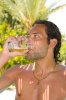 1518462-young-man-drinking-beer-outside.jpg