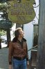 cling-eastwood-standing-below-the-sign-hanging-from-his-restaurant-in-carmel-california.jpg