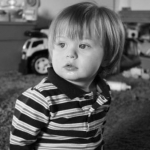 A has so much hair... I can't believe it was even a little tamed here... he usually has crazy hair