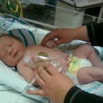 Me & A on C-section day!  He was HUGE! 8lbs 3oz. His mom was out of it... in the operating room she wanted to either name him after the anesthesiologist or ketamine LOL