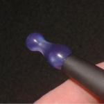 ,,,Dang man, the tip is turned upside down so you can't see the cool swirls..
 Purple "Cherry Vape" pawn tip
 Love me some Cherry vape tips,But I like the Ming style the best..Seems that they're all realy hard to get scratched up .The clean appearance last for a long,long time.And they never get loose while holding a Dct tank down on your cartomizer.No matter what style,They are extremely reliable So I can remove my Dct tanks ,cart,Tip and all and just stick it into a droor or tote. Sometimes I have a few different Dct tanks set up so I can just change to another Dct with a different flavor.
