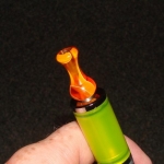 Orange "Cherry Vape" Ming Tip
Love me some Cherry vape tips..They never get scratched up or get loose..They last through months of extreme abuse that a chain vaping builder can put on it..I've had this on jobs rolling around on a bare concrete slab next to my tools and you can't even tell..
So it would probably last  years for those that would  put it through average use in a cleaner and less demanding environment..