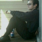 This is me sitting on my friends porch at sun rise.