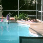 Alexis (Grankid) laying by the pool