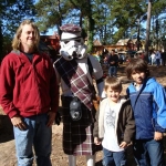 Bryan, Jacob, and Skylar with a Scottish Stormtrooper at the Ren. festival