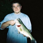 Me and a 21 inch largemouth bass I caught.
