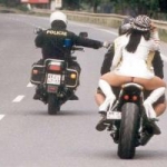 Guess what the silly excuse was for the pullover. Some silly crap about lack of a helmet or something. -- sure thing officer!