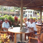 Sitting around sneak'n peeks at the chicks while waiting for some grub at the poolside cafe in Kauai