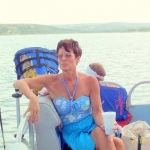 Out on the Lake for a leisurely cruise.  We've just got word they won't allow nude skiing anymore.  One less reason to go for a little sight-seeing out on the lake.  Everything's just goin' to hell around us.