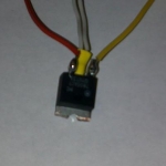 5 volt regulator. I had to cut part of the heat sink off so it would fit.