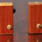 The Journey Man
R&R Manufacturing Box Mod
BATTERIES: 1x 18650 3.7V / 2x RCR123A 6V or 5V  	
ATOMIZERS: 510
BASE UNIT PRICE: $135 	
SUPPLIERS: R&R Manufacturing Store is located in the USA 	REVIEW: http://www.youtube.com/watch?v=4P0s6B9DmfQ&feature=related
NOTES : Wooden box mod with different wood type combinations. Built-in liquid container (3ml or 6ml) and manual pump. Button orientation for left or righ-handed can be chosen.