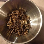 This is what a well-aged, 15-year-old $12 Santa Damiana Robusto looks like after being copped up with kitchen shears...