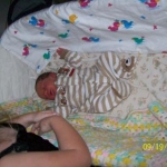 Gavin and part of Emily the day we brought him home