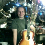 Me holding a guitar