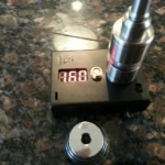 Checking the coil on the Ohm Meter. Shows 1.6 Ohms exactly. I wanted a 2.0 Ohm coil, and rebuilt the coil using a 3/4 wrap and got exactly 2.0 Ohms.