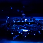 Water drop, splash in blue