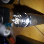 30 gauge Kanthal core, 0.6mm flat ribbon wrapped around. 1.4 ohms. Vicious ant Cyclone rda