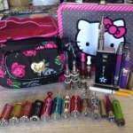 Collection has grown quite a bit, but there *might* have been even more updating after this. The pink train case & HK lunchbox are full of juice and the little rose clutch is where I stash all my batteries and tanks.