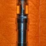 DID Genesis RBA w/hole drilled out to 1/16th...on a Novice 14500 clone