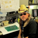 haloween at the office. I wouldn't ordinarily wear sunglasses at my desk. I'll let you guess if the hair is real.