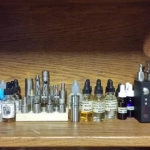 My Vape Shelf, where I keep all my juice, cotton, wire, and most of my mods. I have two Nemesis clones that aren't on my shelf and one ego that stays in use most the time and does not have a slot on the stand.