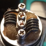 IMG 0745 26 gauge kanthal with .5x1mm ribbon wrapped under 34 ga nichrome 60 clapton