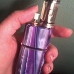 Genie with a stainless steel Liquinator and "Burple" Pawn drip tip.