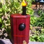 Phidias Woodimus, octagon edge. Purpleheart panels with Padauk inlay.