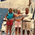 ME, CAPTAIN JIMMY BECK, AND OUR ANGLER WITH HIS TROPHY BARRACUDA.
AND YES, I DID PUT THIS TOOTHY BARRACUDA IN THE BOAT!
