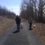 My Hubs and our youngest walking the pups =)