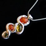 Fire Opal Pendant made for the gene Simmons family ( Nick Simmons wears it)