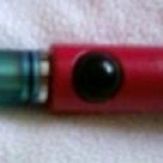 My latest additions, blue DCT with 1.5ohm carto on a red bolt, TrustFire  18650 2000mAh 3.7V battery with a vase style drip tip. March 2012