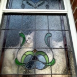 Mawson and Mimsy at bathroom window
