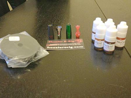 2 spools of Kanthal (26 and 30ga), 5 bottles of NicQuid I won on the JeannieK Show, and some eGo cones, a drip tip and a tank filler funnel from Hoozier E-Cigs...