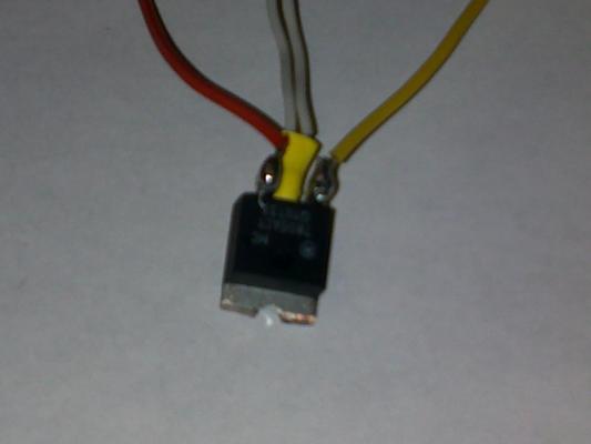 5 volt regulator. I had to cut part of the heat sink off so it would fit.
