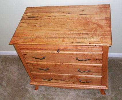 A chest of drawers I made 15 or so years ago. Still love the highly figured wood.