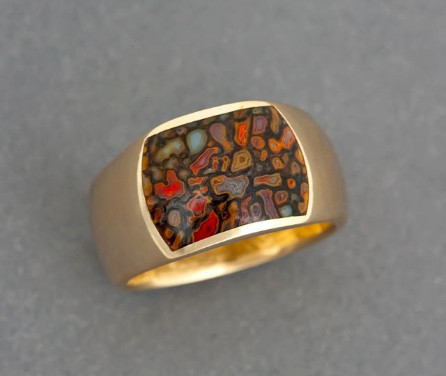 A+ grade fossilized gem dinosaur bone inlayed in 14k