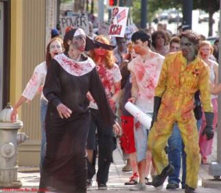 Alamo Drafthouse- Zombie Walk '07 or '08. (Bad with dates)
I'm right behind the zombie in the bright yellow jumpsuit. I'm holding a free poster, haha.