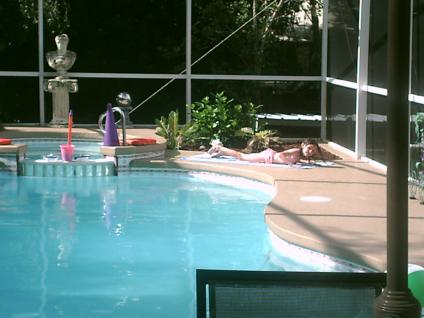 Alexis (Grankid) laying by the pool