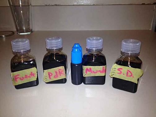 All four cigar NETs strained and bottled! The two maduro cigars took a LOT longer to drip through the filters for some reason, but all of them yielded about 60ml.