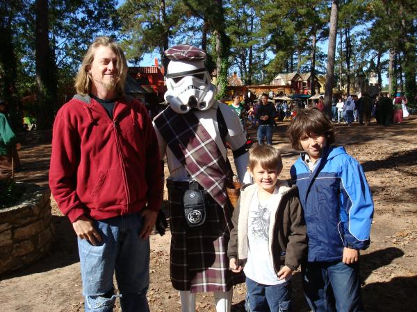 Bryan, Jacob, and Skylar with a Scottish Stormtrooper at the Ren. festival