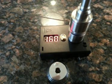 Checking the coil on the Ohm Meter. Shows 1.6 Ohms exactly. I wanted a 2.0 Ohm coil, and rebuilt the coil using a 3/4 wrap and got exactly 2.0 Ohms.