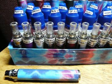 close up of the storage box wrapped and one battery wrapped in same colored Duct Tape.