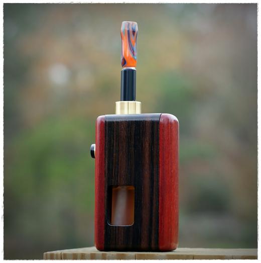 cocobolo/ebony 
Is away visiting in Colorado for awhile